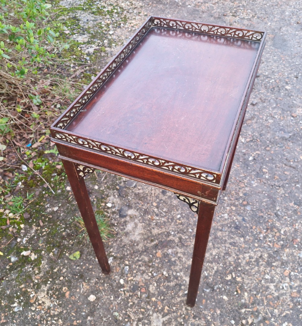 Small mahogany silver table with fret work gallery.  View XIII