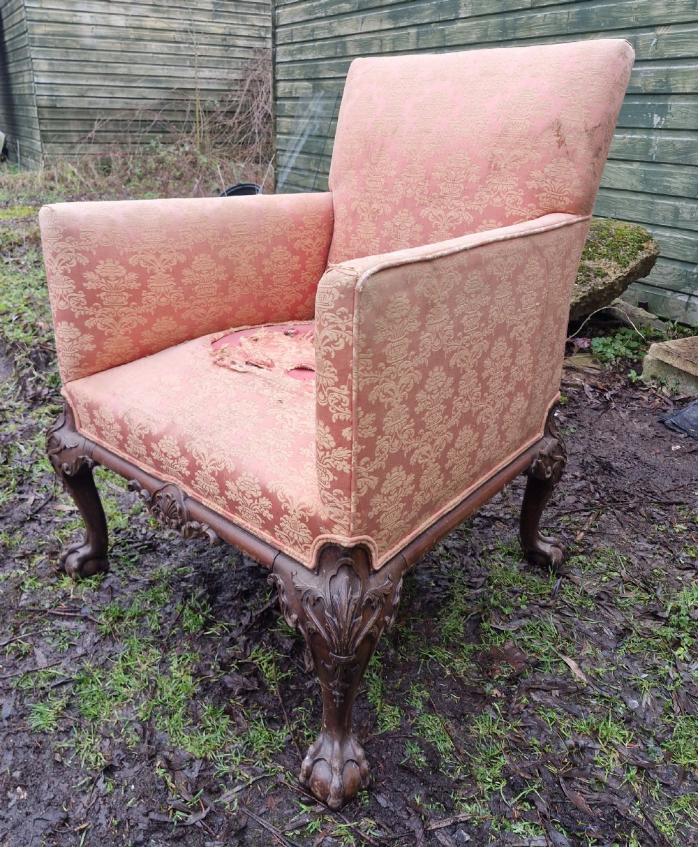 Edwardian carved Mahogany framed upholstered armchair. 