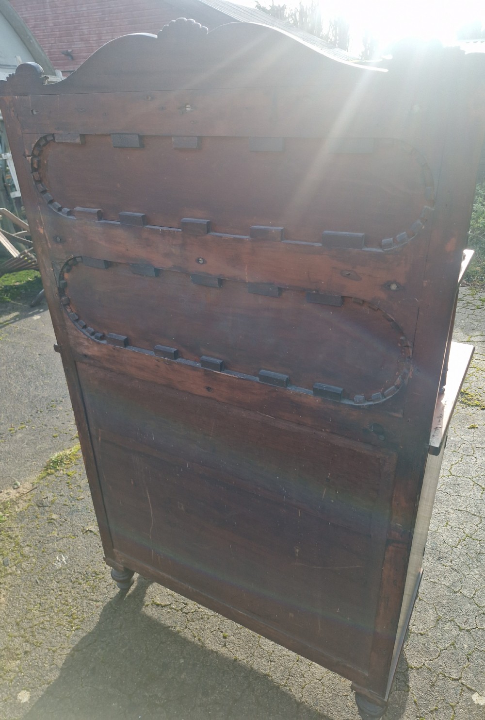 A Regency mahogany side cabinet featuring a two-shelf upper superstructure with turned columns, a top drawer, and a two-door lower cupboard with arch-moulded panels. View II