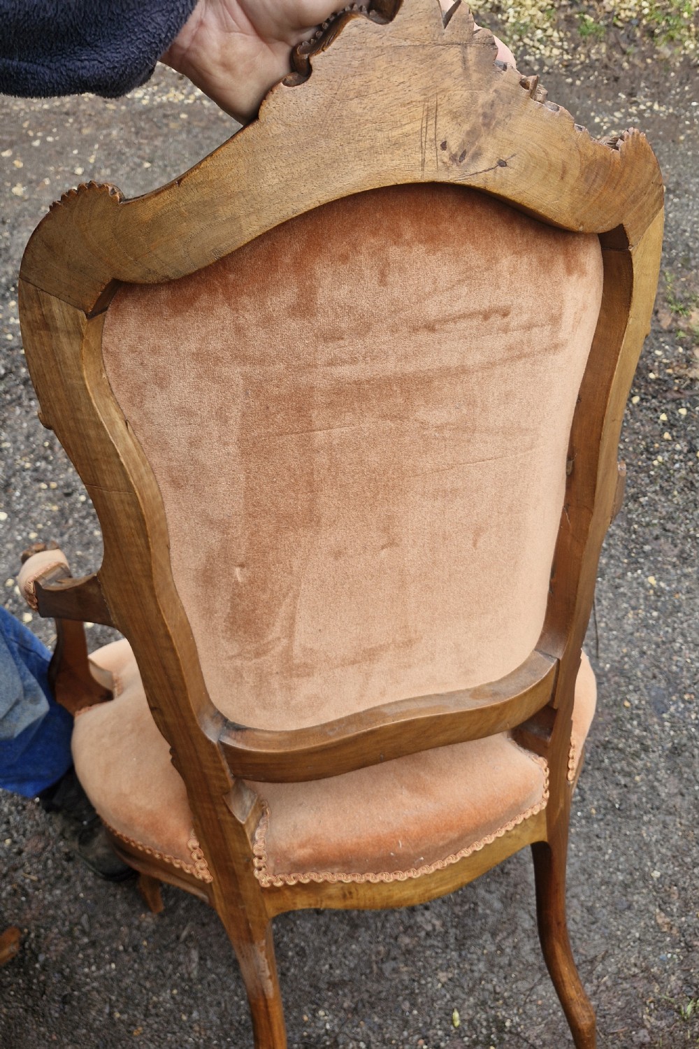A pair of French Louis XV style carved walnut fauteuil armchairs with open padded armrests and peach velvet upholstery. View VIII
