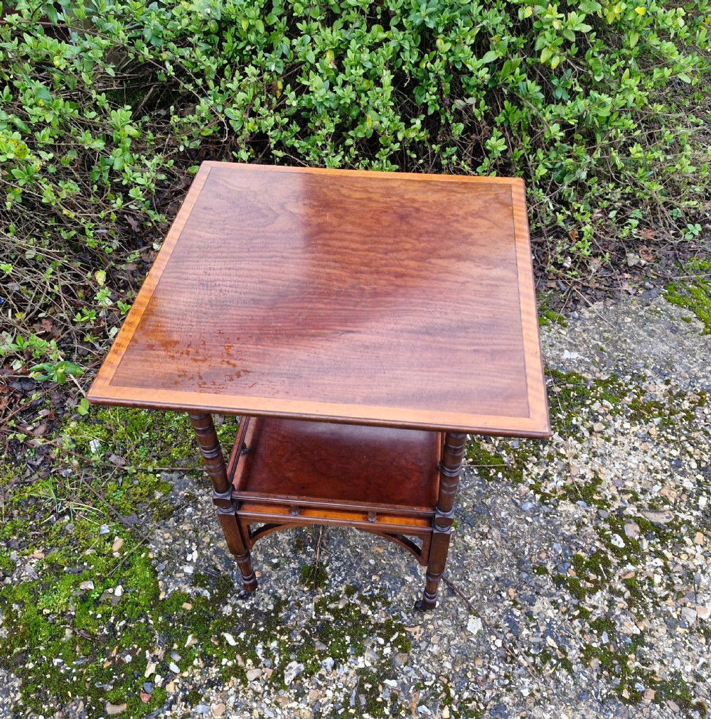 Inlaid mahogany occasional table in the style of Godwin.  View II
