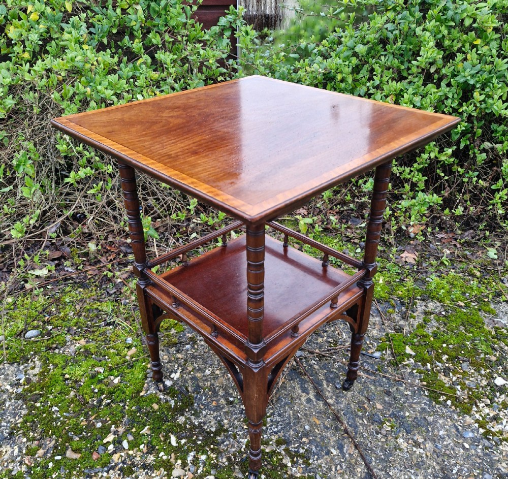 Inlaid mahogany occasional table in the style of Godwin.  View III