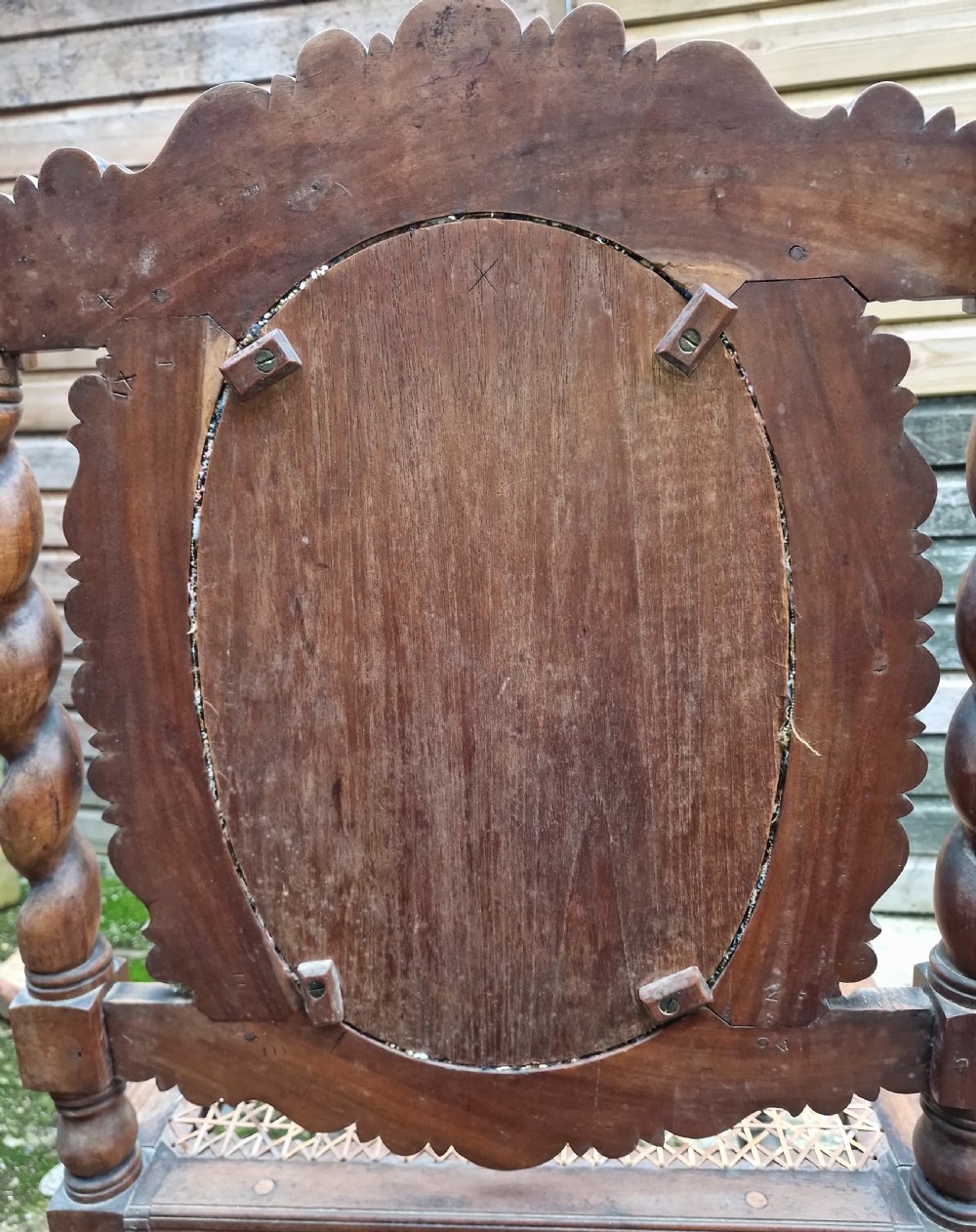 A late 19th-century carved satinwood hall chair featuring barley twist supports, a woven cane seat, and an oval tapestry back panel. View III