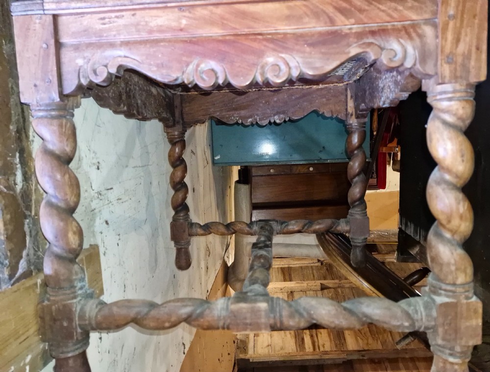A late 19th-century carved satinwood hall chair featuring barley twist supports, a woven cane seat, and an oval tapestry back panel. View VI