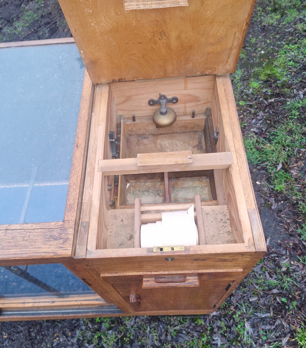 Oak shop cabinet complete with till and working bell. View II