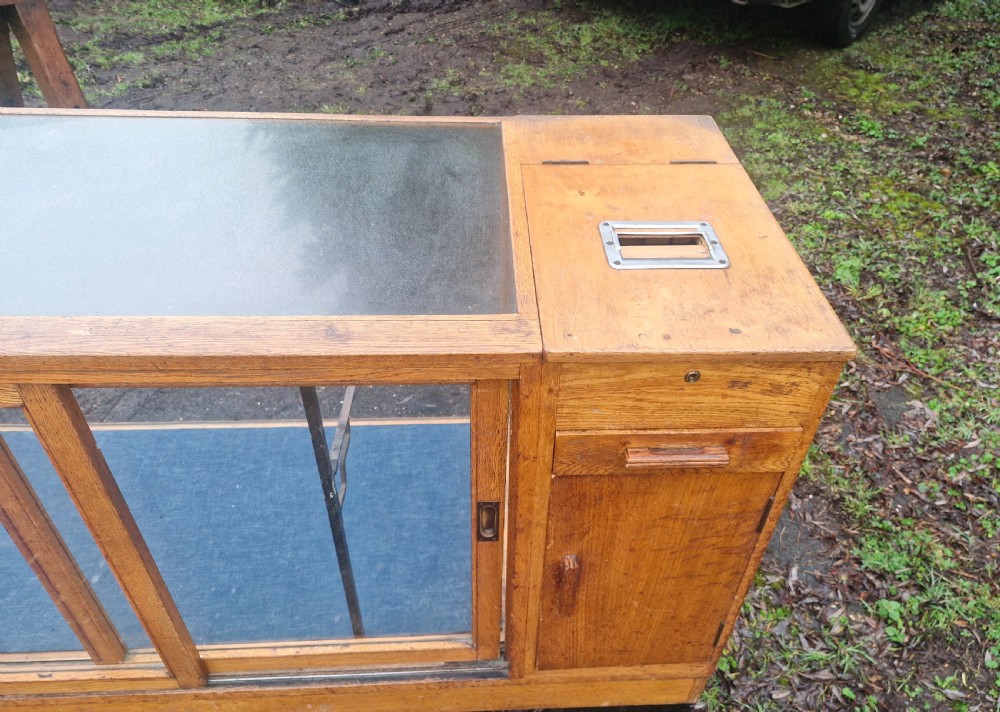 Oak shop cabinet complete with till and working bell. View IX