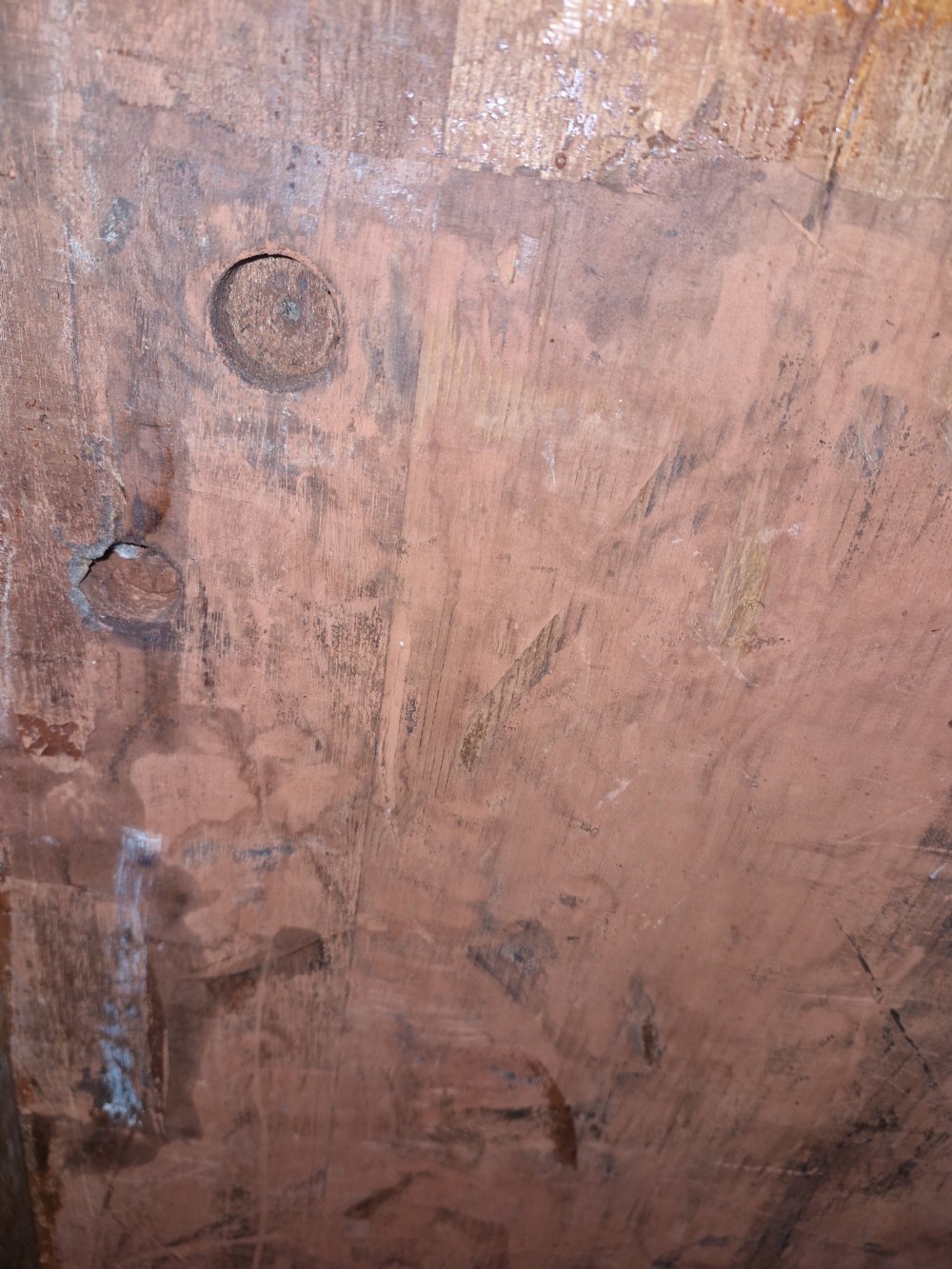 A low mahogany campaign chest of drawers with recessed brass handles and keyholes. View V