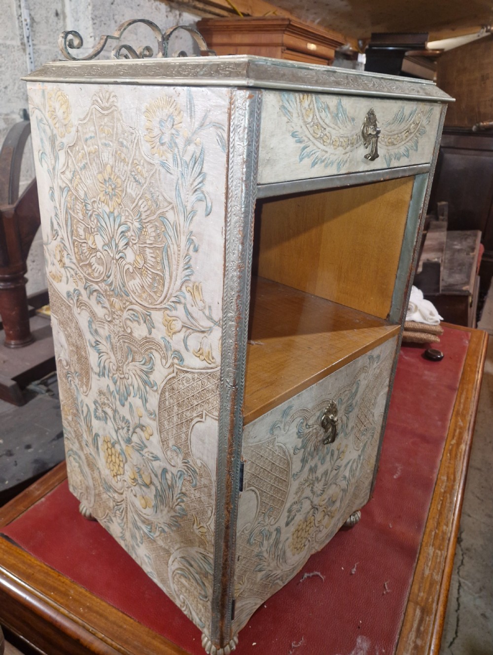 Pair of unusual decorated and painted leather bedside cabinets.  View III
