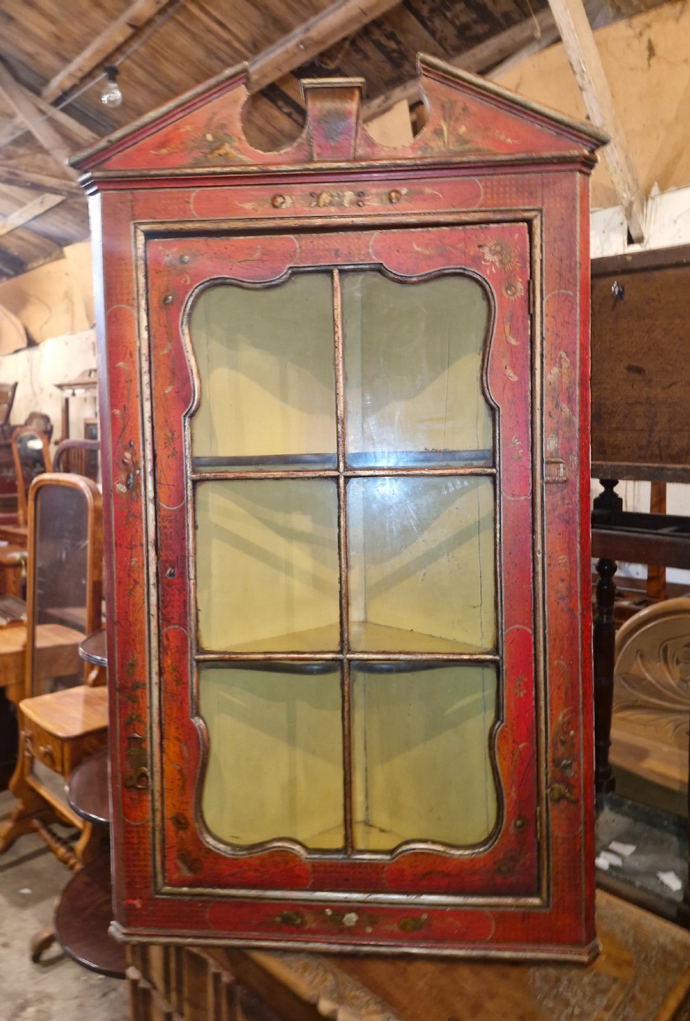 Very pretty docorated corner cabinet. 