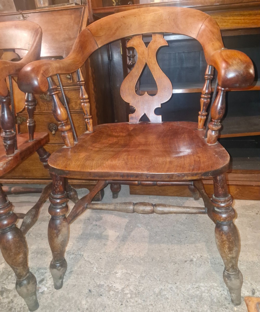 Pair of Victorian Smokers bow armchairs. View II