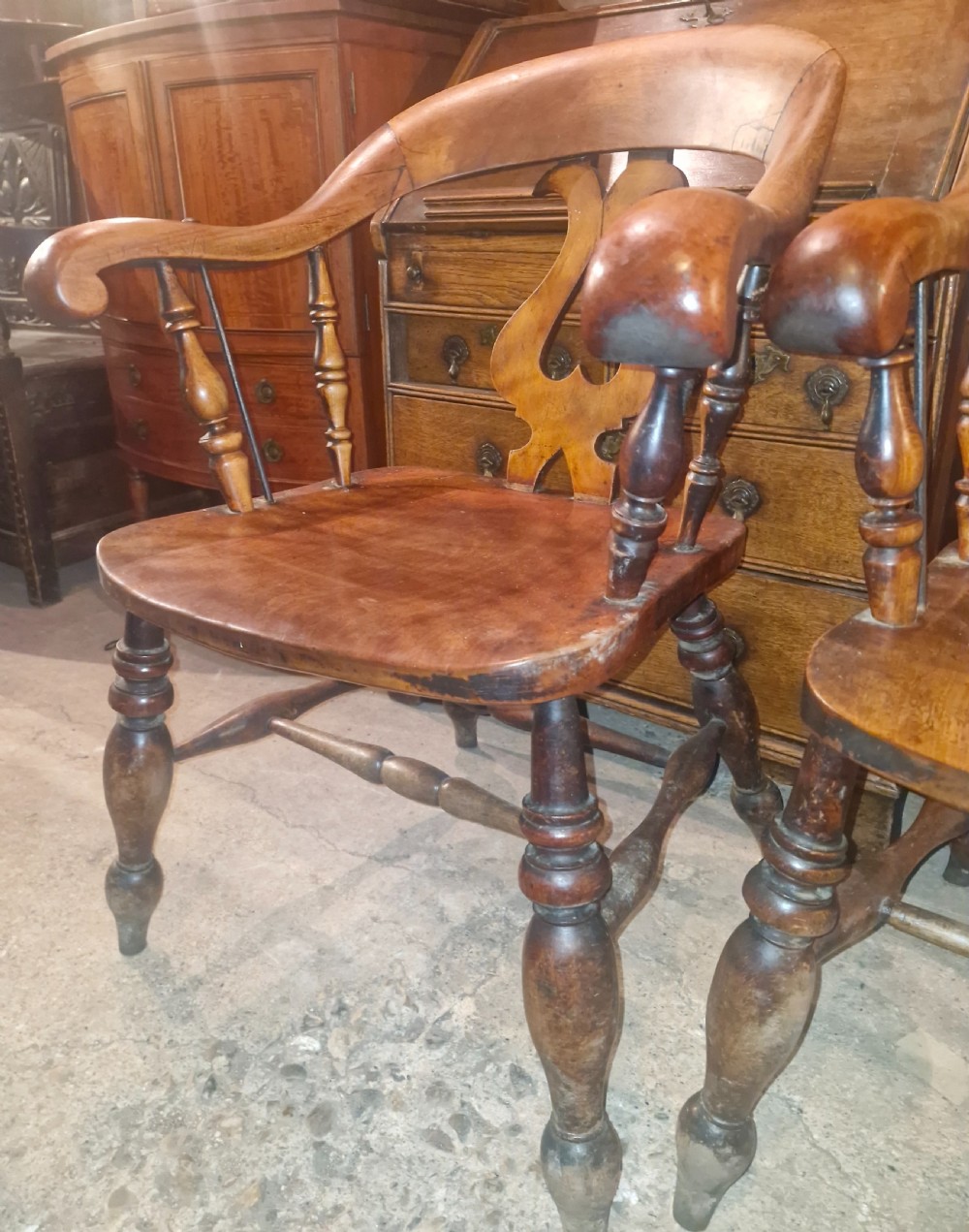 Pair of Victorian Smokers bow armchairs. View III