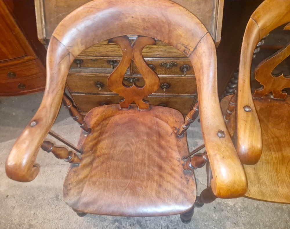 Pair of Victorian Smokers bow armchairs. View IV
