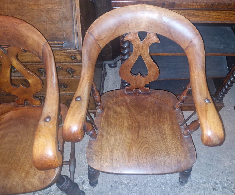 Pair of Victorian Smokers bow armchairs. View V