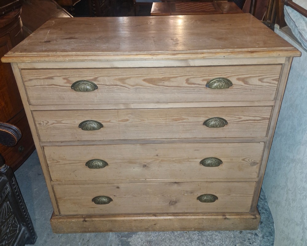 Late Victorian pine chest of 4 long drawers. 