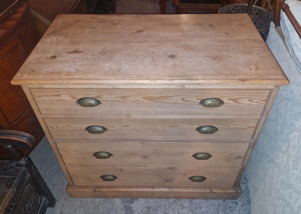 Late Victorian pine chest of 4 long drawers.  View II