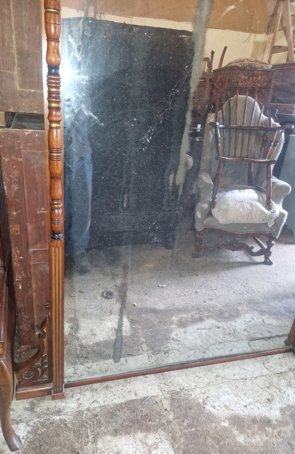 A large Victorian walnut hall mirror featuring a projected upper cornice, turned side columns with gilt highlights, and inlaid corner details. View XI