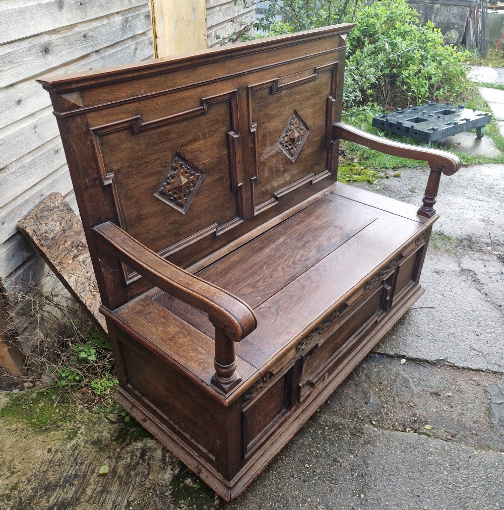 Edwardian oak hall seat with lift up seat. View IV
