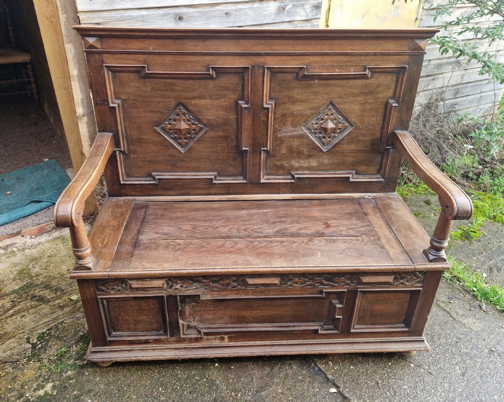 Edwardian oak hall seat with lift up seat. View V
