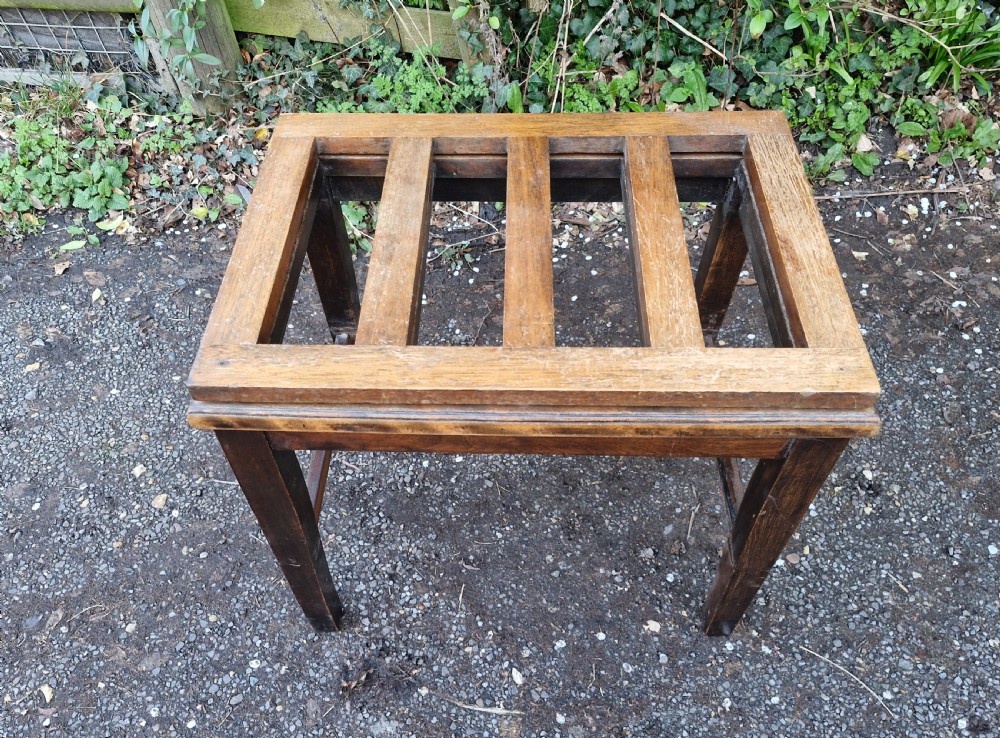 Luggage stand with fold up back . View II