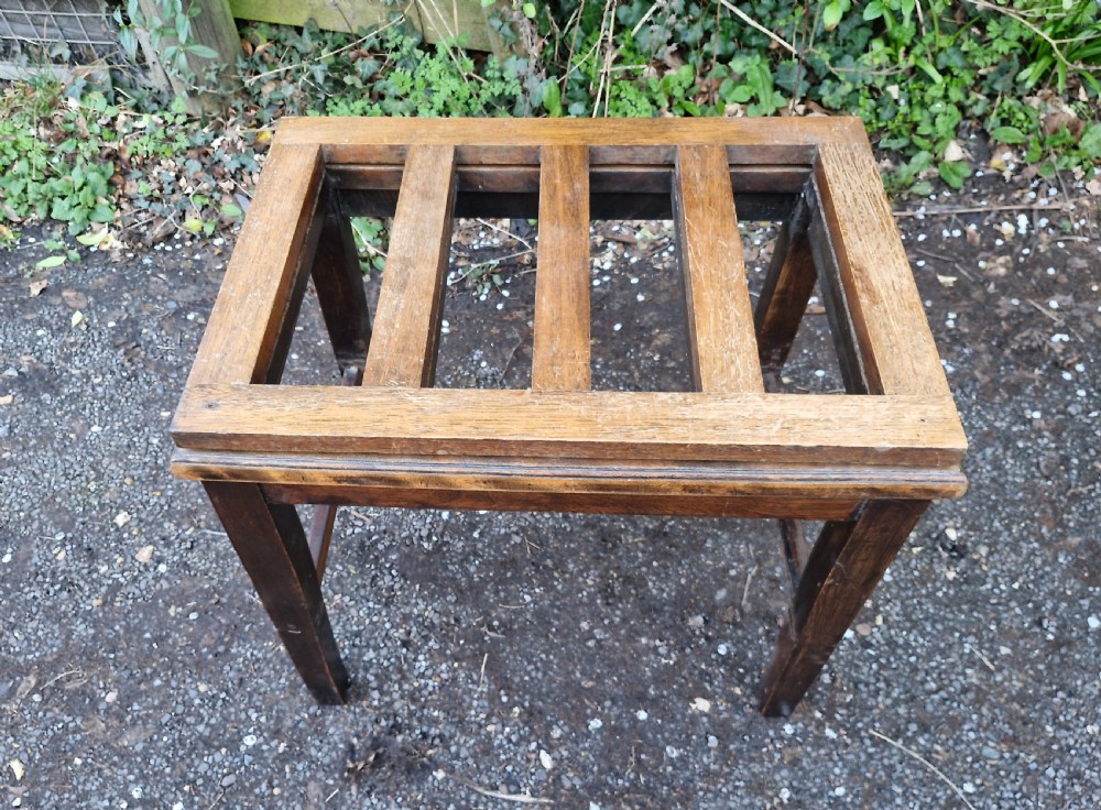 Luggage stand with fold up back . View V