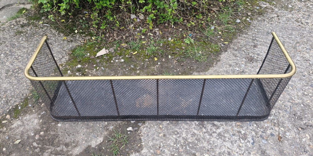 Late Victorian mesh fire fender. View VI