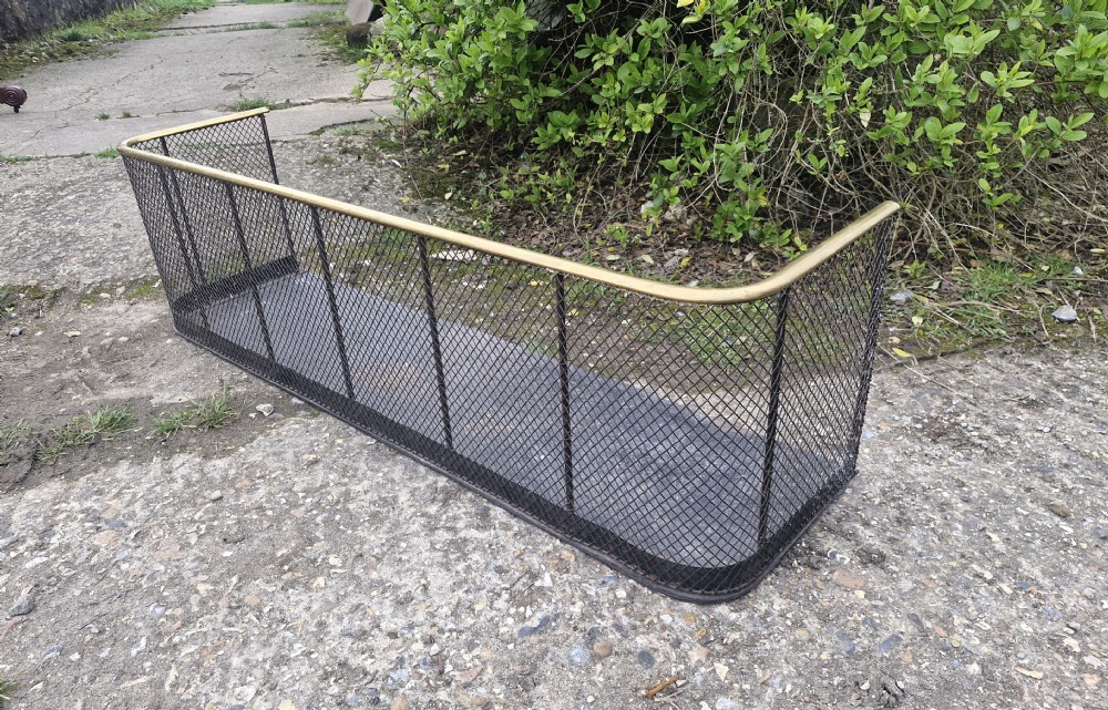 Late Victorian mesh fire fender. View VII