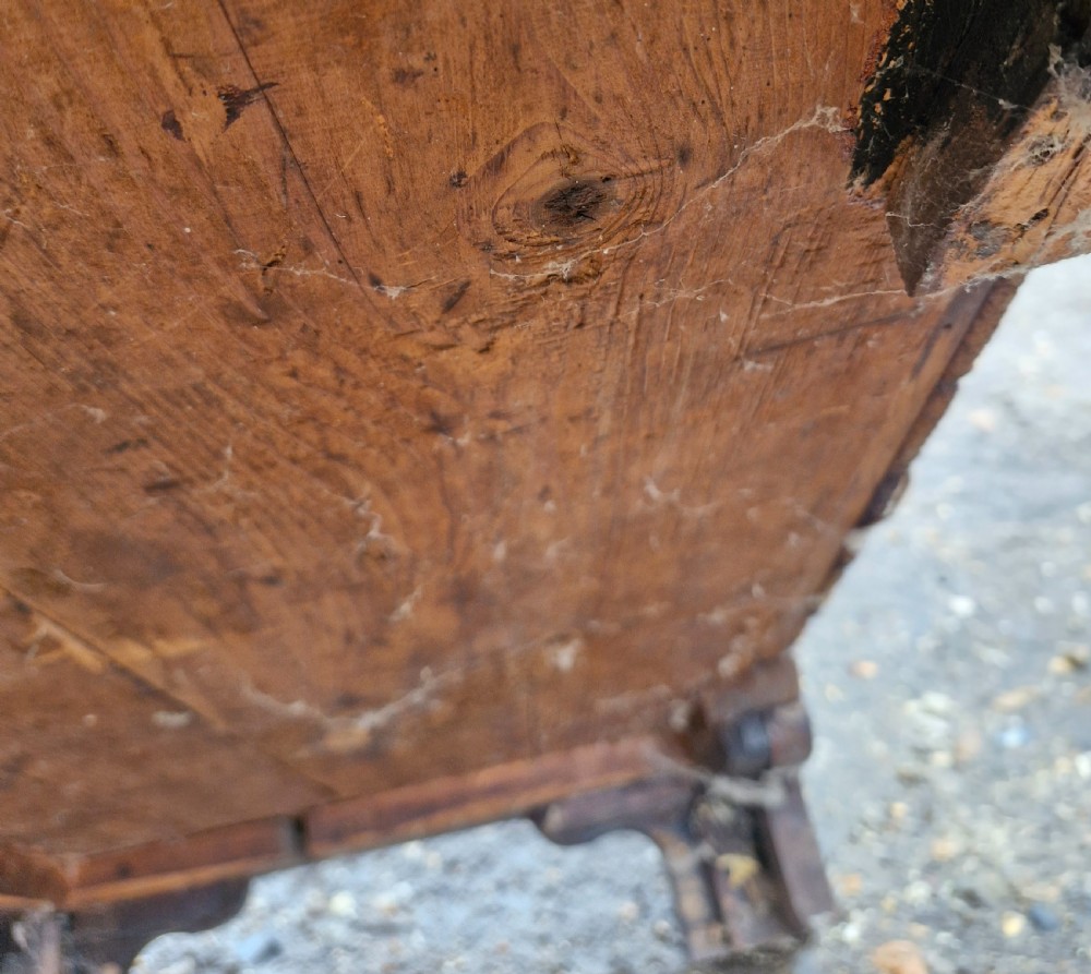 An 18th-century Georgian mahogany chest of drawers featuring four graduated drawers with brass swan-neck handles, a pull-out brushing slide, and bracket feet. View XIV