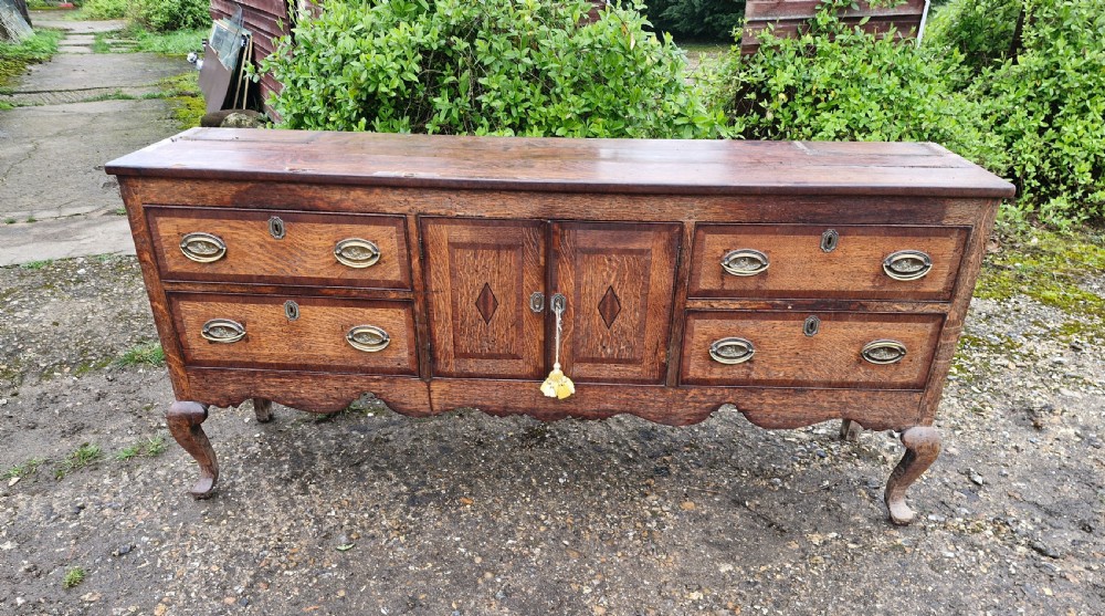 Antique Shropshire oak and banded dresser base.  View II