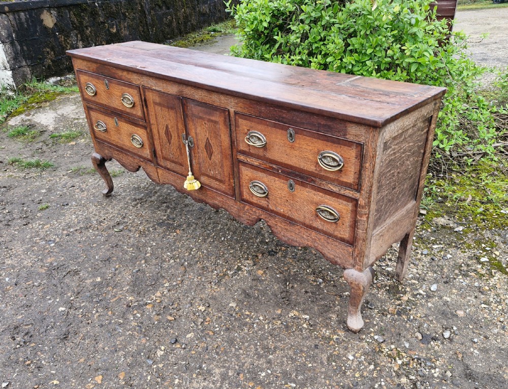 Antique Shropshire oak and banded dresser base.  View V