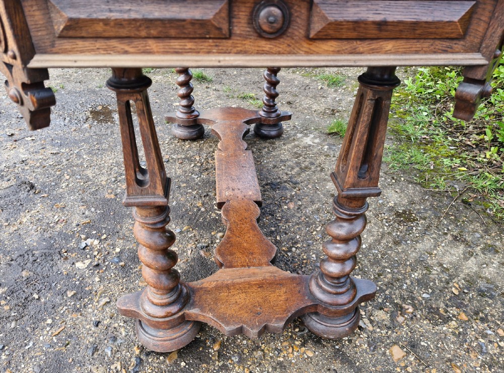 Early Victorian oak Gothic 2 drawer writing table in the manner of Richard Bridgen.  View II