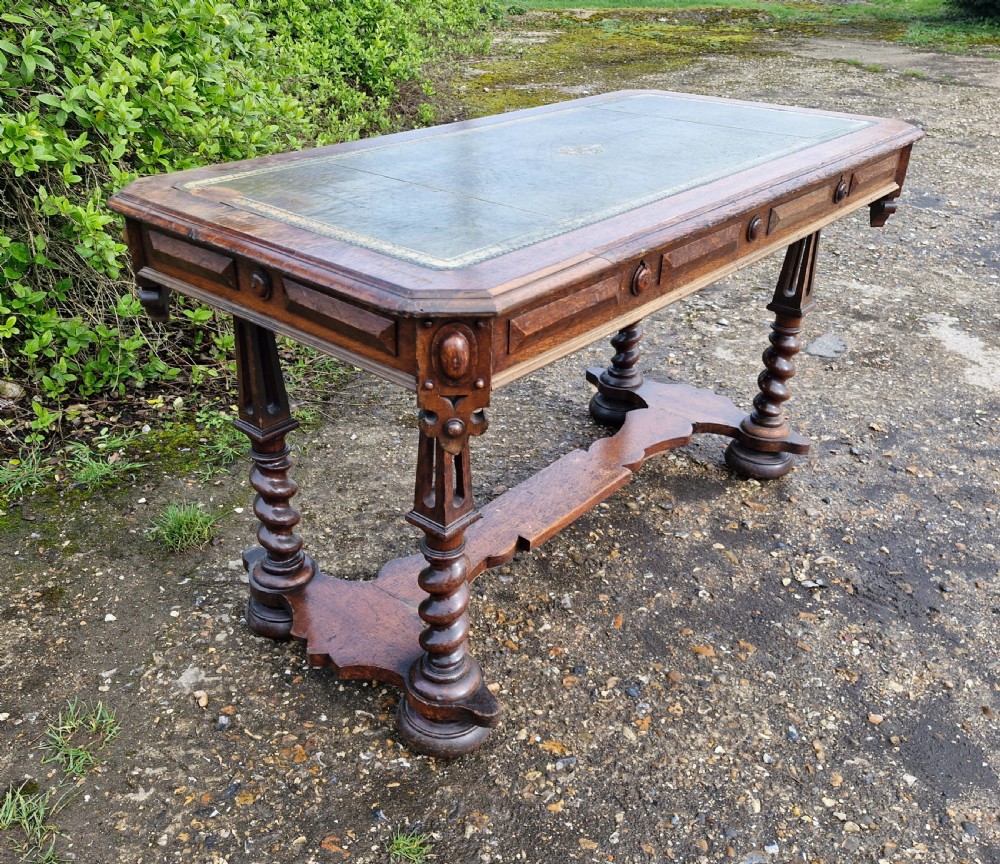 Early Victorian oak Gothic 2 drawer writing table in the manner of Richard Bridgen.  View IV