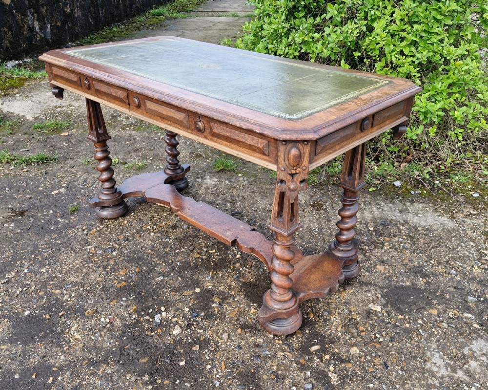 Early Victorian oak Gothic 2 drawer writing table in the manner of Richard Bridgen.  View VI