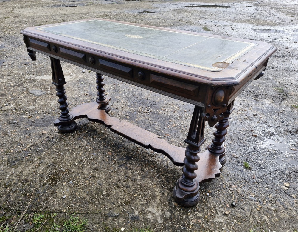 Early Victorian oak Gothic 2 drawer writing table in the manner of Richard Bridgen.  View VII