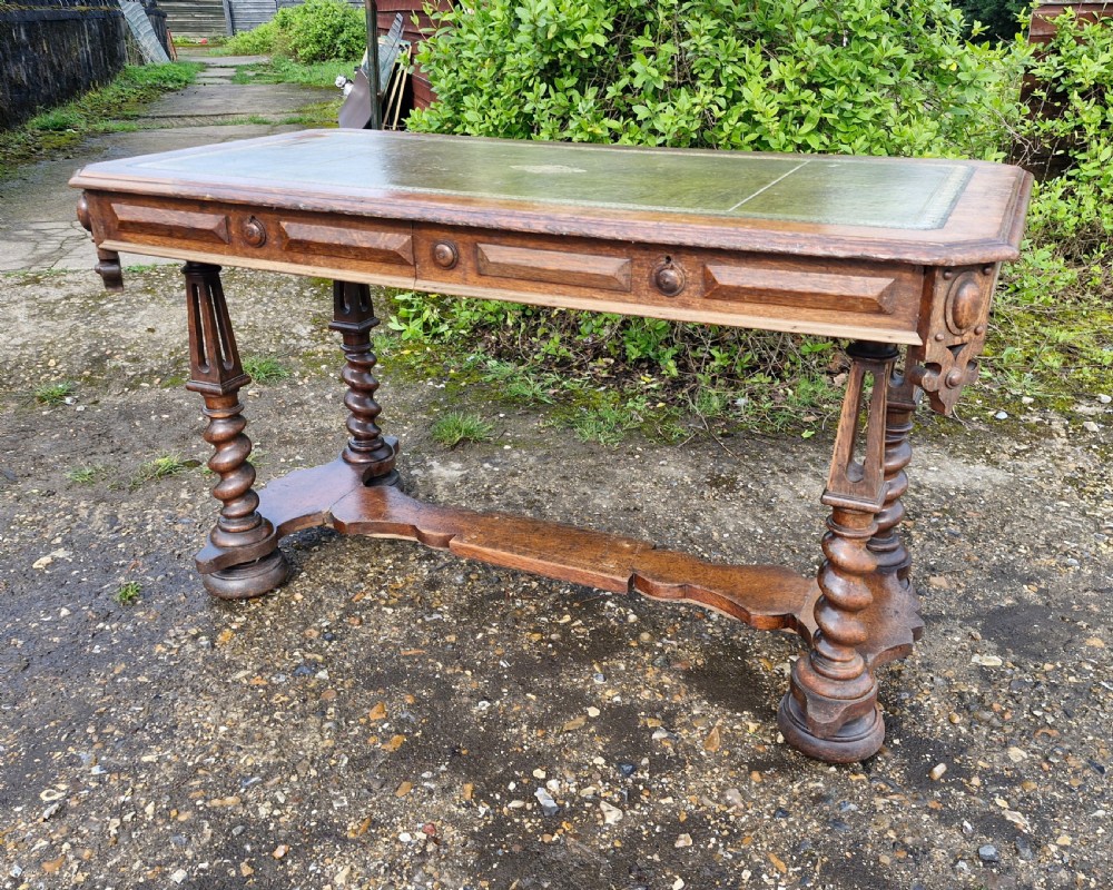 Early Victorian oak Gothic 2 drawer writing table in the manner of Richard Bridgen.  View VIII