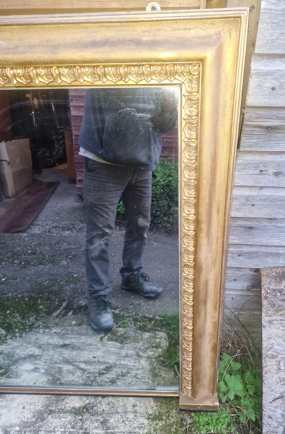 A large 19th-century rectangular overmantel mirror featuring an ornate gilded frame with classical repeating egg-and-dart moulding. View IV