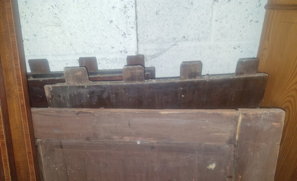 A pair of nineteenth-century mahogany wardrobe doors featuring central oval inlay panels and rectangular lower framing. View III
