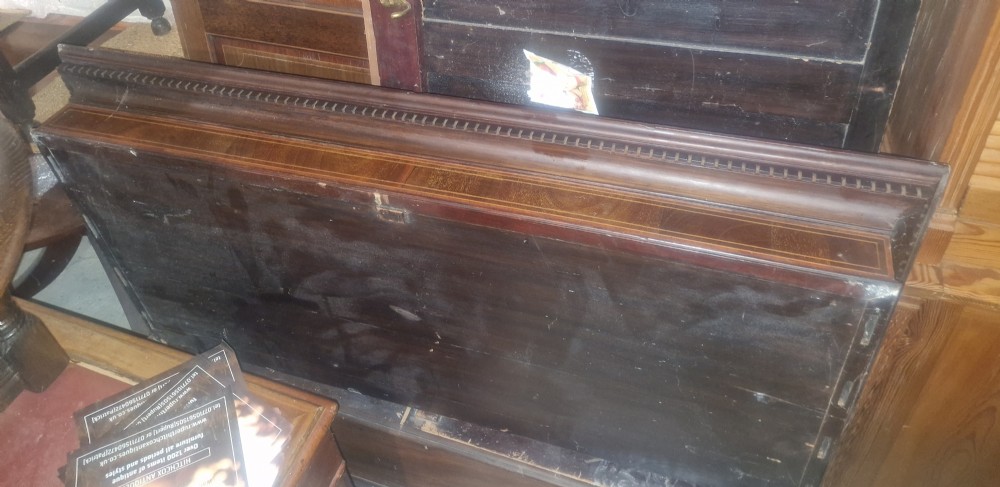 A pair of nineteenth-century mahogany wardrobe doors featuring central oval inlay panels and rectangular lower framing. View VIII