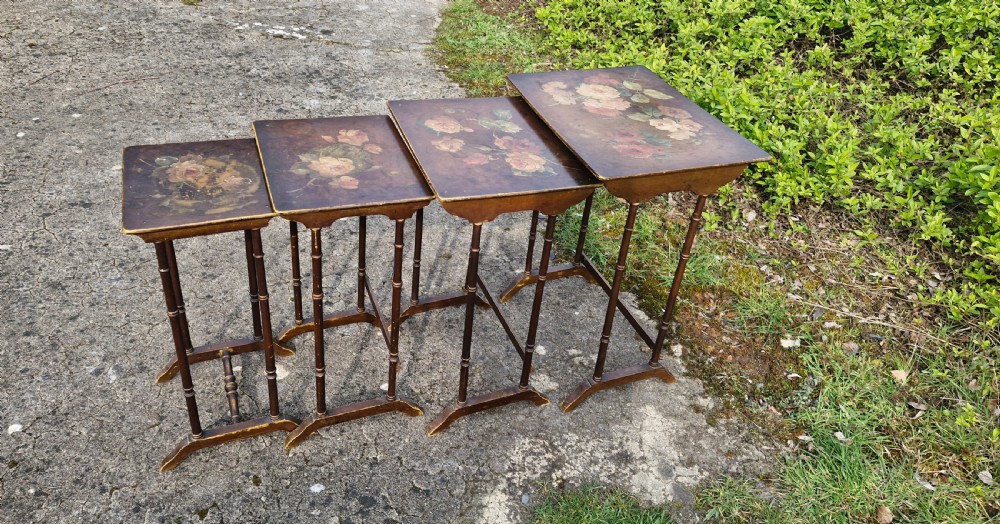 Nest of 4 painted and decorated occasional tables.  View V