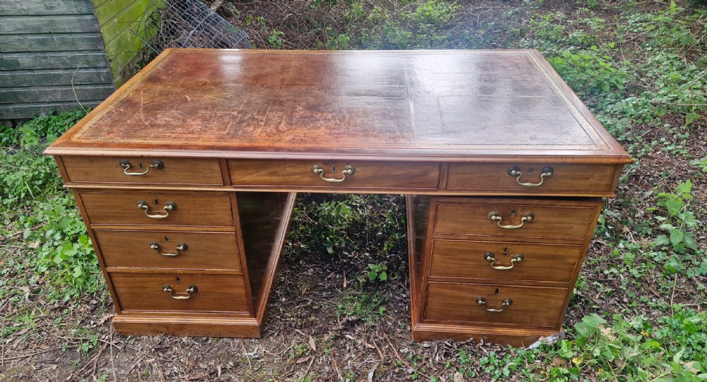 Early Victorian mahogany partners pedestal writing desk. Unusual side drawers. 
