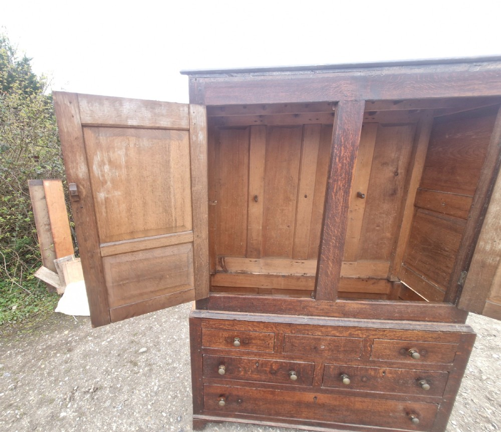 Late Georgian oak 2 part housekeepers cupboard.  View III