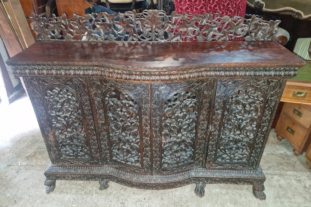 Carved Anglo Indian 4 door side cabinet. 
 View VI