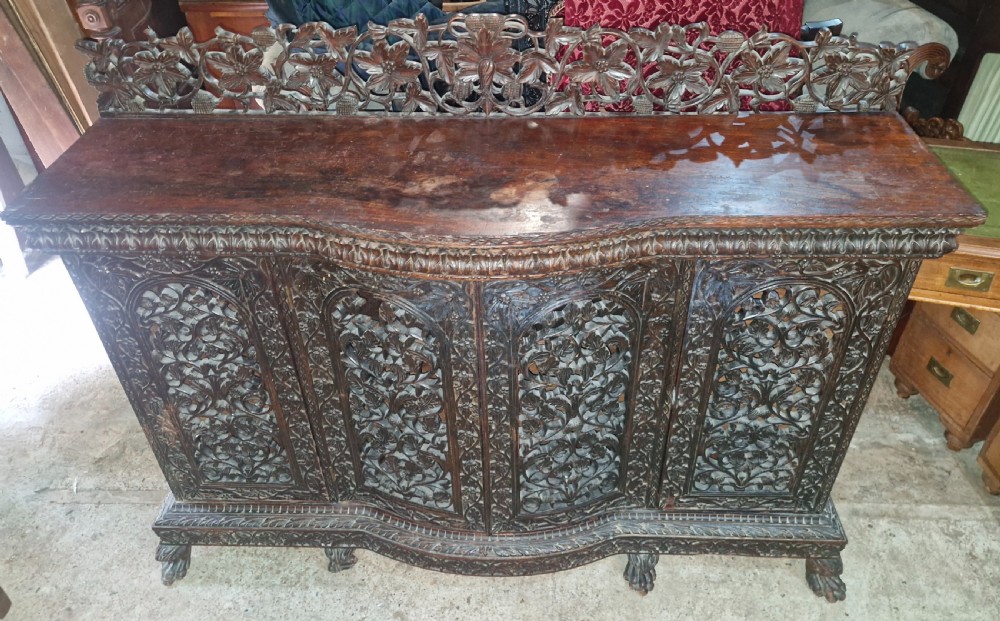 Carved Anglo Indian 4 door side cabinet. 
 View VII