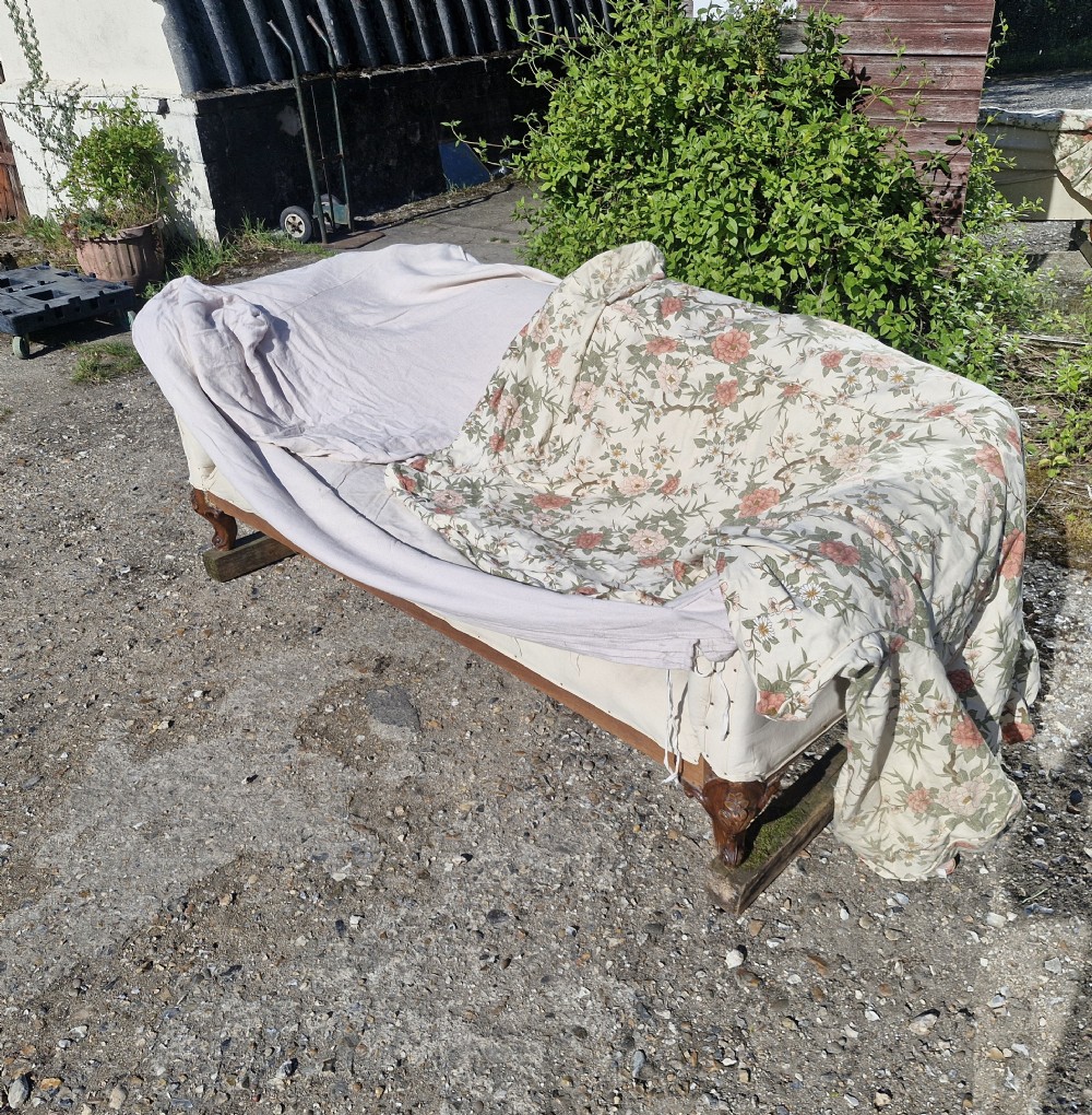 Victorian country house sofa with 2 loose covers.  View XIX