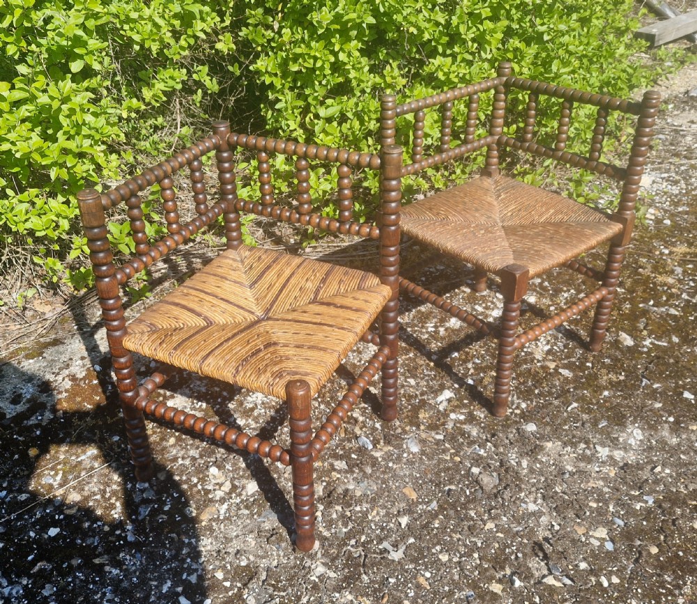 Pair of Bobbin framed corner chairs. 