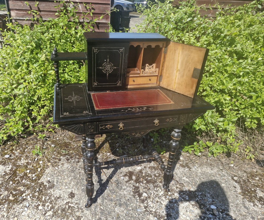Victorian ebonised writing table.  View IV