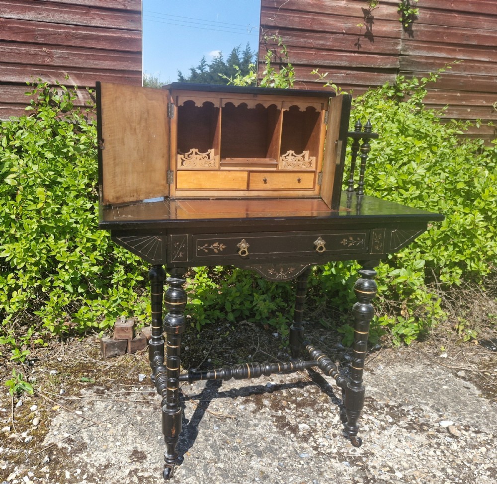 Victorian ebonised writing table.  View VI