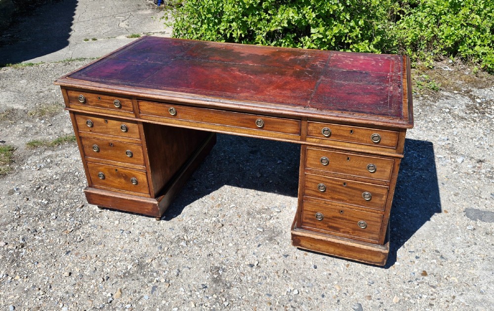 Large 19th century mahogany kneehole pedestal writing desk. 