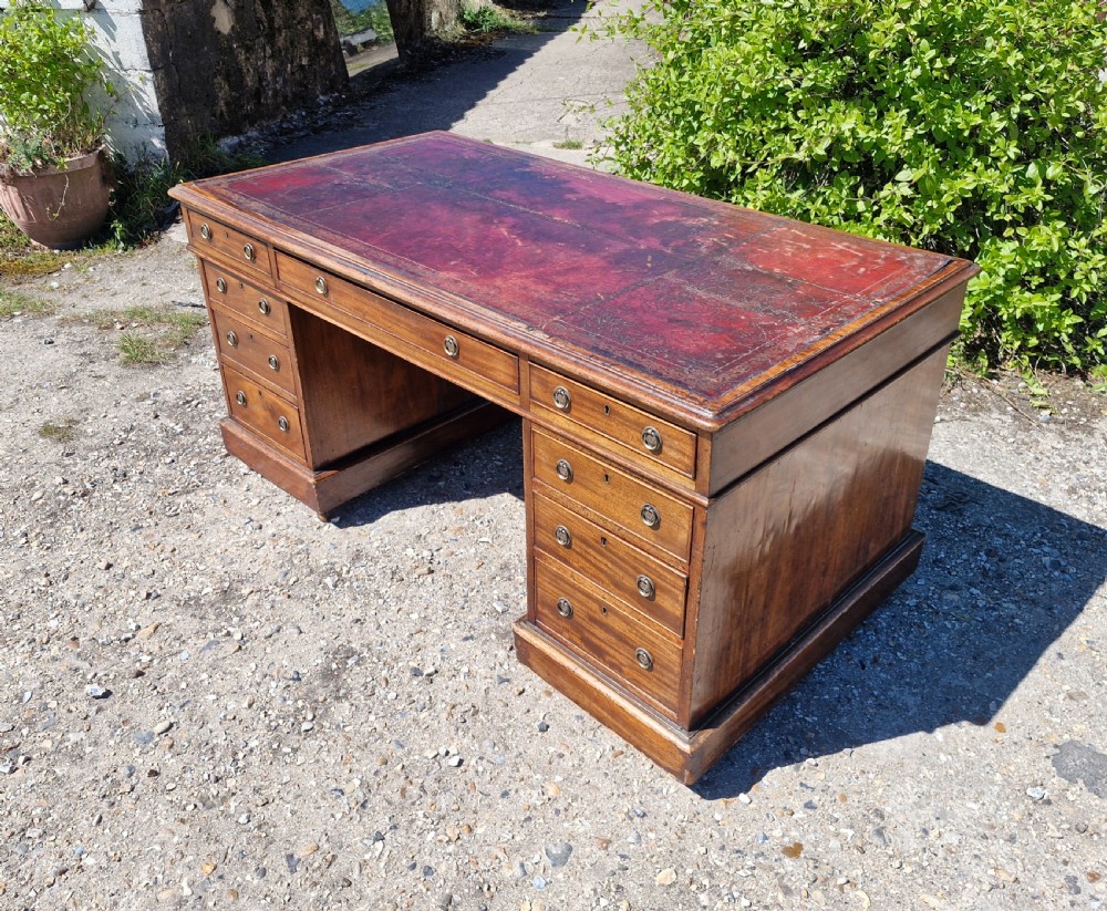 Large 19th century mahogany kneehole pedestal writing desk.  View V