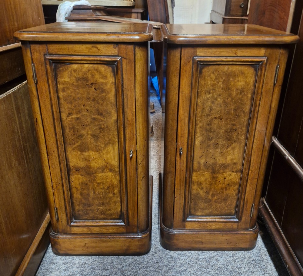 Pair of walnut bedside cabinets. 