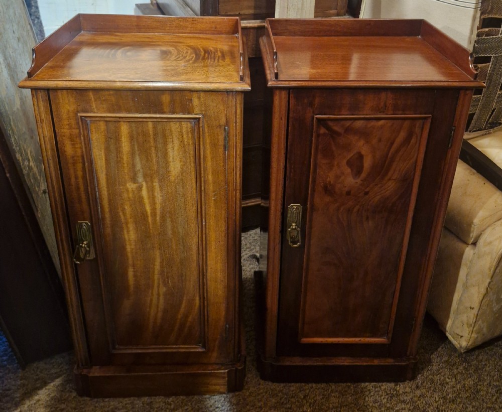 A very near pair of mahogany bedside cabinets. 